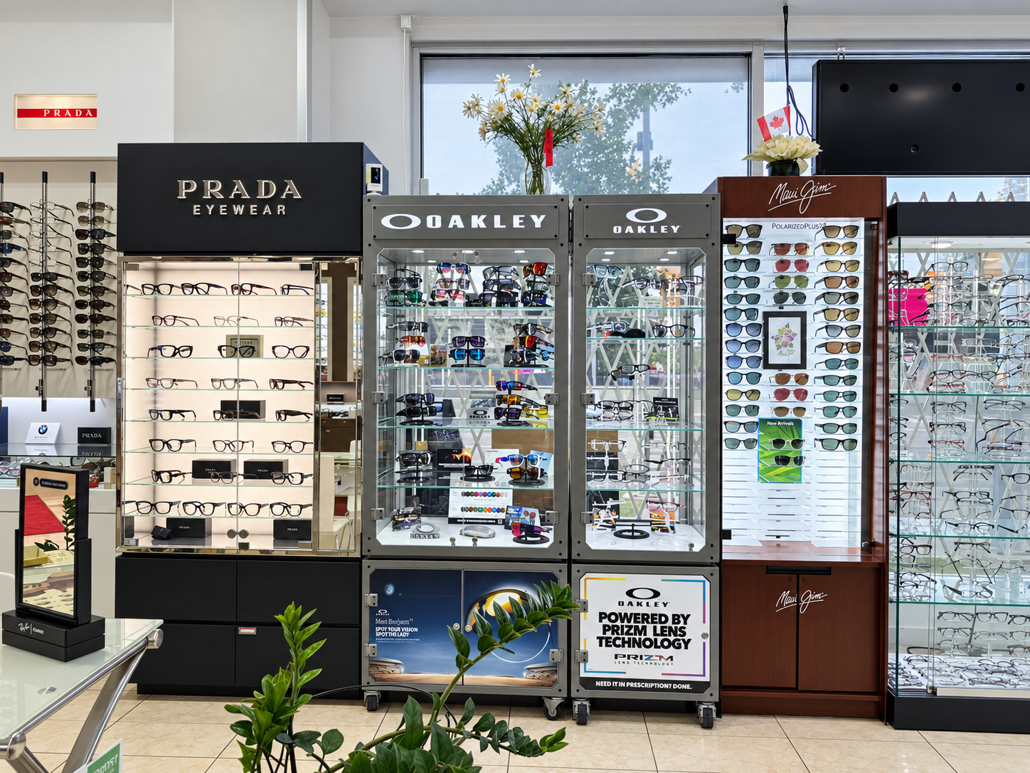 Prada, Oakley and Maui Jim eyewear displays at Optical Trust